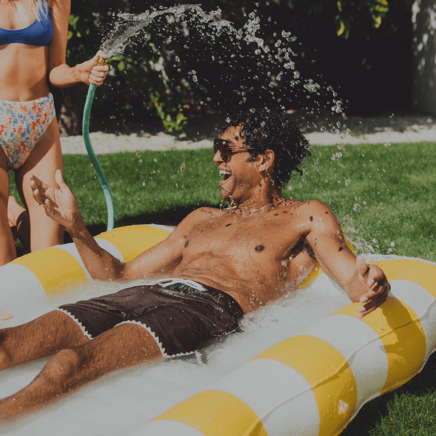 2-in-1 Tanning Pool Lounger Collection. Use in or out of the water. Yellow and White