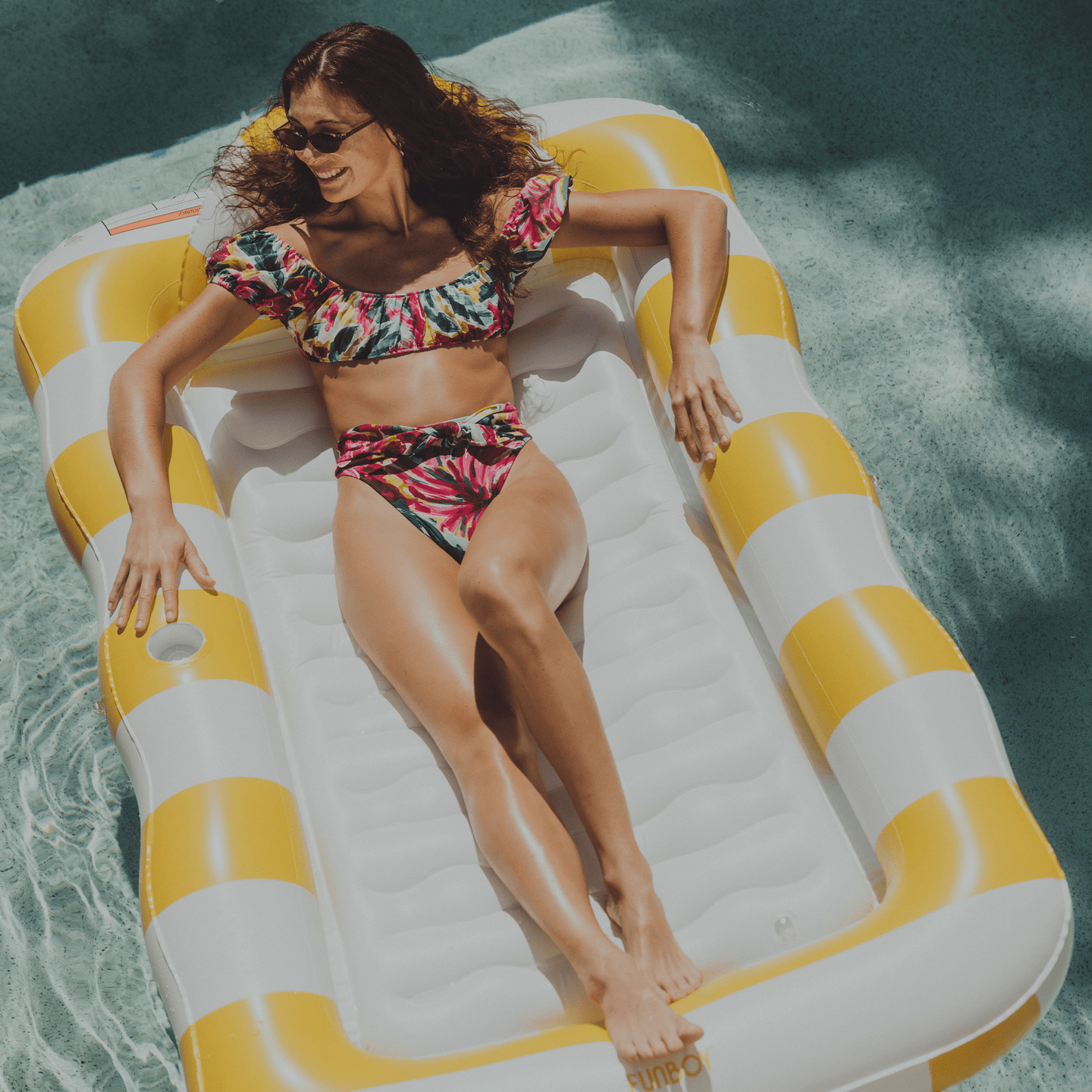 2-in-1 Tanning Pool Lounger Collection. Use in or out of the water. Yellow and White